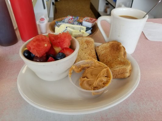 Fresh fruit, whole wheat toast dry, peanut butter, koffee, perfect.