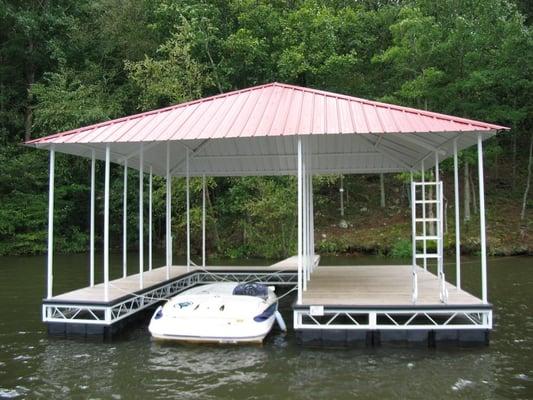 SIngle Slip Boat DOck with Hip Roof created by Boat Dock Works