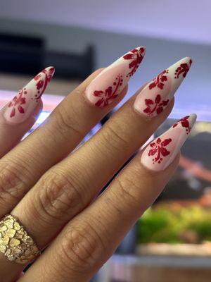 Beautiful hibiscus nail art. Almond shaped frenchies!