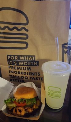 Double burger with crispy onions. Shack lemonade.