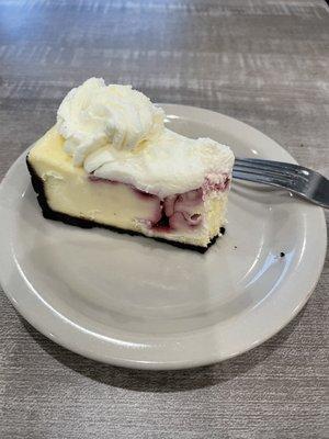 White Chocolate Raspberry Cheesecake (minus one bite)