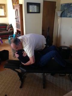 Adjusting patient M.L. at her home.