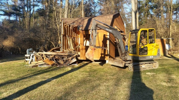 Musso's Excavating demolished a residential garage with their excavator in Bernville, PA on 1/20/16.