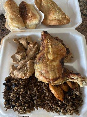 Rice and beans, Baked Chicken, Pork Chunks, beef empanada, cheese danishes or blintzes. As the picture shows everything was dry.