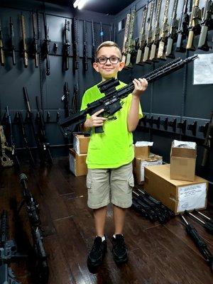 My son with the new AR-15, The Reaper