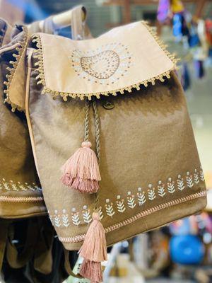 LOVE the pink & beige backpacks from Nepal also what to do what to do OuiOui.