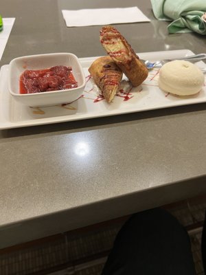 Deep fried Cheese cake; Vanilla ice cream and Strawberries.