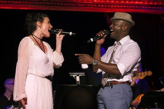 Idina Menzel and Taye Diggs sing a duet at their karaoke benefit with NY Karaoke & Boston DJ Matt & Ray running the Bands words.