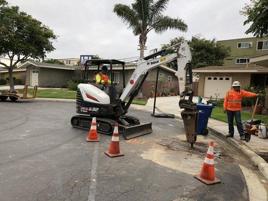 street demolition to repair broken water service.