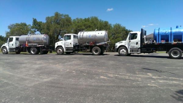 3 of 4 Freightliner water trucks, ranging from 2,000 - 3,200 gallons.