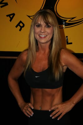 5th Degree Black Belt and Master Instructor Sandy Hughes teaches both Adult Martial Arts classes and Fitness Kickboxing.