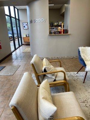 A lovely, calming front desk and waiting area.