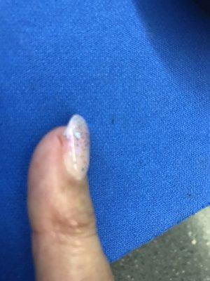 Small cut on the side of nail when Donna used file too hard!