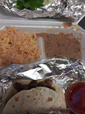 Kids taco plate, rice and salsa was pretty good, beans mushy, beef fajita super tough and chewy