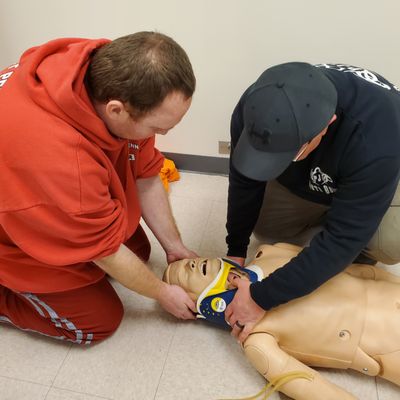 Applying a cervical collar.