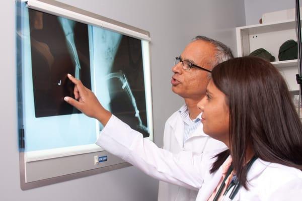 Dr Saini & Dr Patel reviewing a X ray.