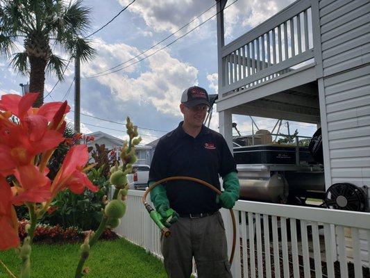 Michael treating a lawn in Longs, SC.