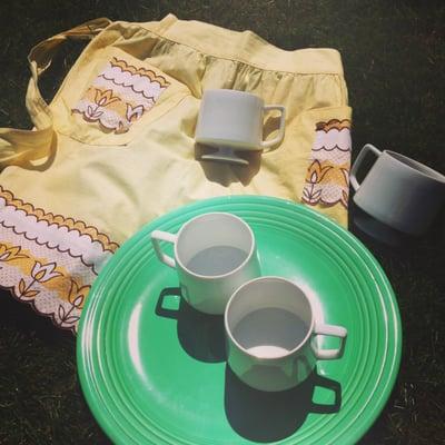 Cups were $4, Fiestaware platter was $8, and apron was $3.