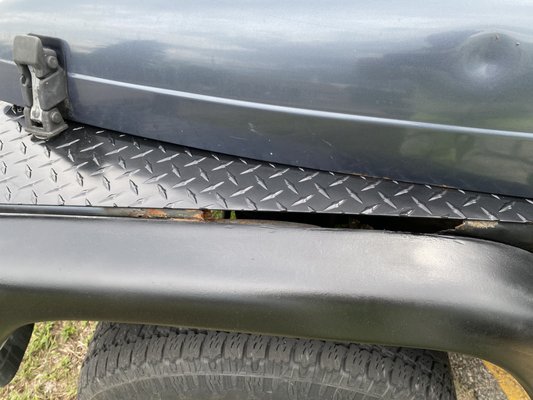 Diamond plate to cover over a missing fender from rust.