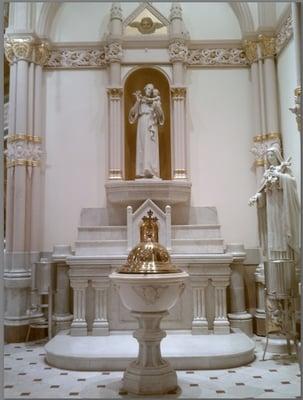 St. Joseph Altar at St. Michael's Church with baptismal font.