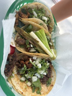 Top to bottom: pastor, carnitas, campechano tacos