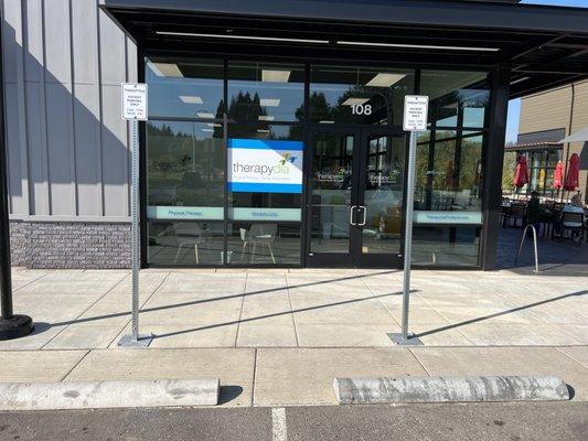 Two designated parking spots for patients right up front.