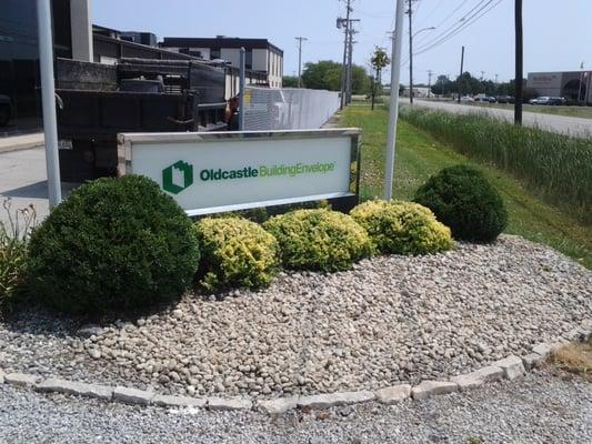 Some Nice Fresh Rock and Solar Lighting behind the sign for a clear view at Night