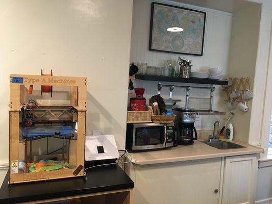 Our kitchen area, with free tea and coffee, as well as our 3D printer.