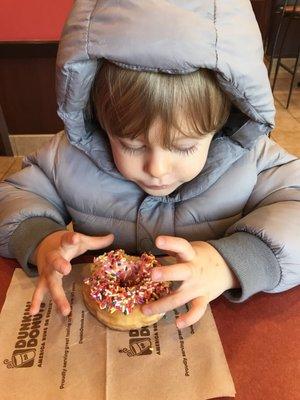 He loved the strawberry with sprinkles donut...