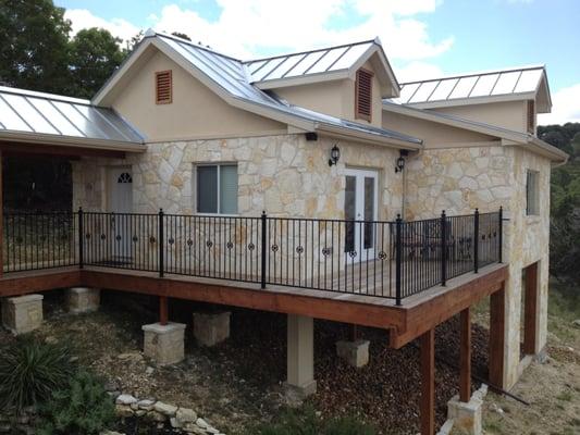 Spring Branch home built on hillside; alternative to expensive foundation. We can also build in bonus rooms below.