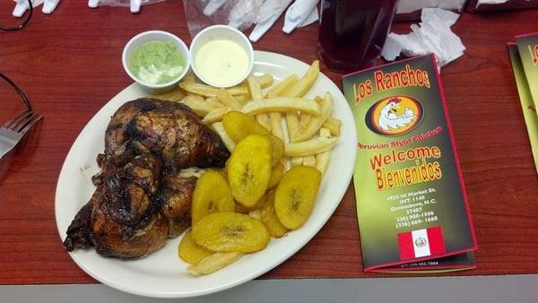 Rotisserie chicken with plantains & french fries.