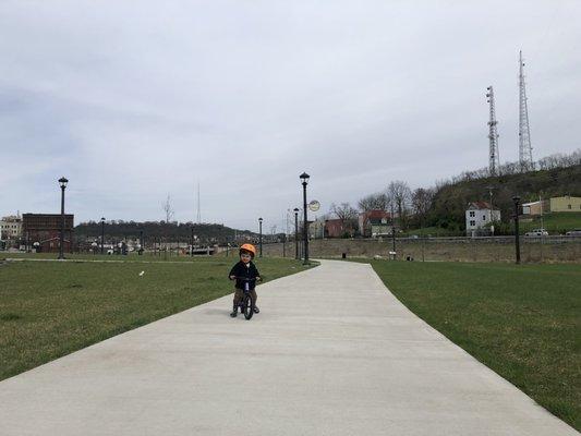 Miniman rides bike