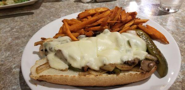 Vegetarian special order: Philly "no steak" cheese and veggies sandwich with sweet potato fries and pickle spear.