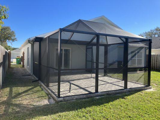 Exterior Patio with roof extension and cage complete.