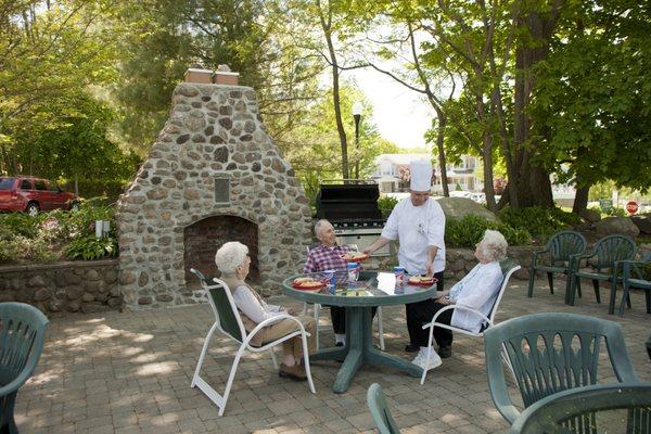 Residents having a meal on the Hillcrest patio