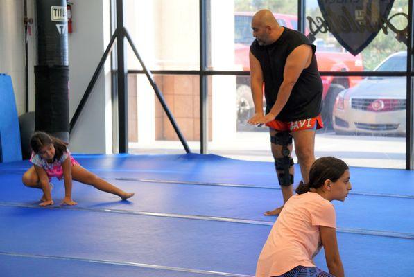 Our Muay Thai coach Javier instructing a student