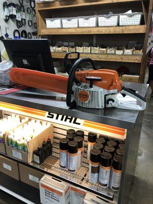 Stihl MS-261CM on the counter at Town & as they begrudgingly fetched a check to refund me for the saw they couldn't fix.