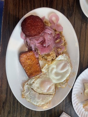 #5. 2 Fried Eggs Served with Mashed Green Plantains, Fried Cheese, and Salami Breakfast