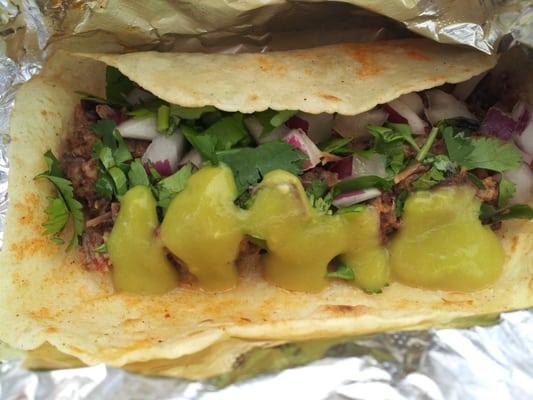 One al pastor taco with green sauce (the same "crack sauce" they have at el Pollo Loco, el Pollo Regio, and TacoDeli).