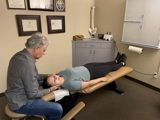 Dr. Cook treating a patient