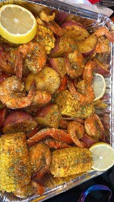 Snow crab leg, shrimp, corn, potatoes