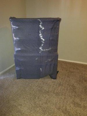 We wrap all delicate and important furniture in a thick blanket and plastic wrap for extra protection!