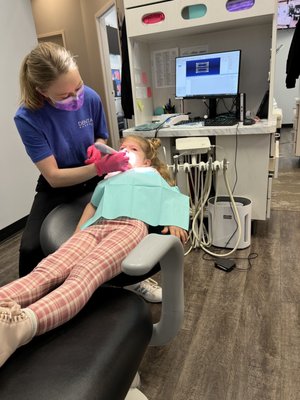 Dental cleaning for the kiddo. She thought it was a blast!