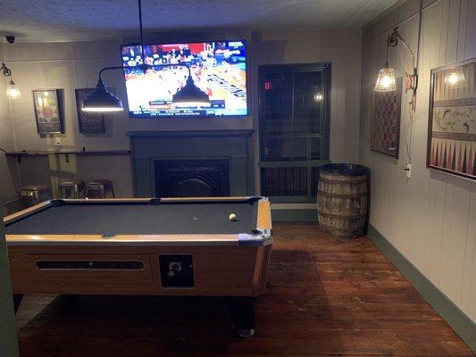 Pool tables and TVs upstairs