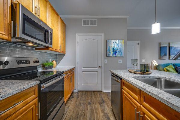 Dallas White countertop with brown or grey cabinets? Both look phenomenal