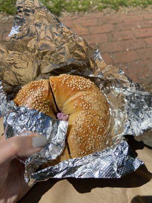 Sesame bagel with blueberry cream cheese