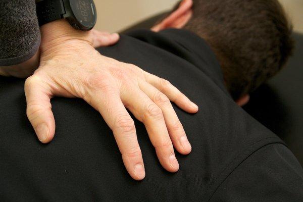 Physical Therapists at Peak Performance address back pain.