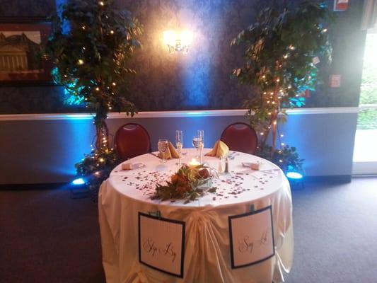 Uplighting the sweetheart table.