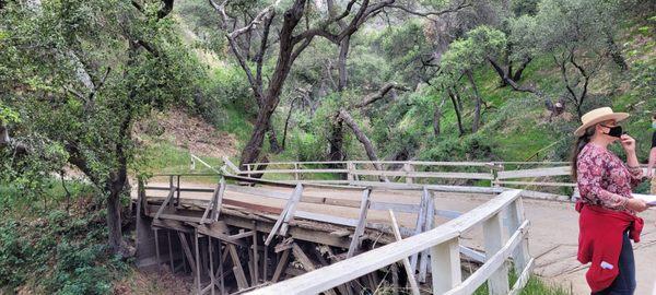 A sign warns you that you use this bridge at your own risk