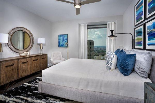 Enjoy luxurious bedrooms with the comfort of ceiling fans.